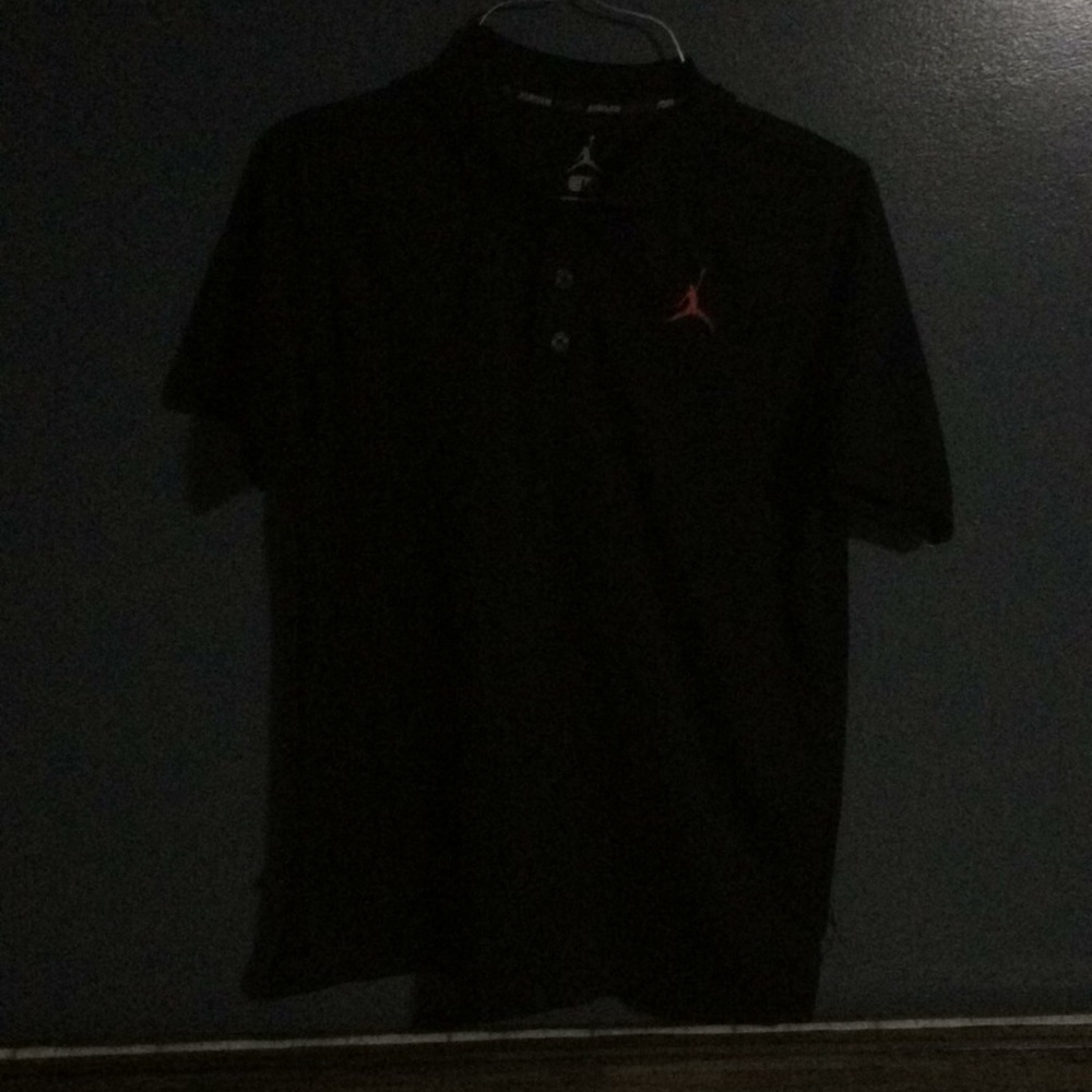 It’s a collard Sri fit Jordan shirt